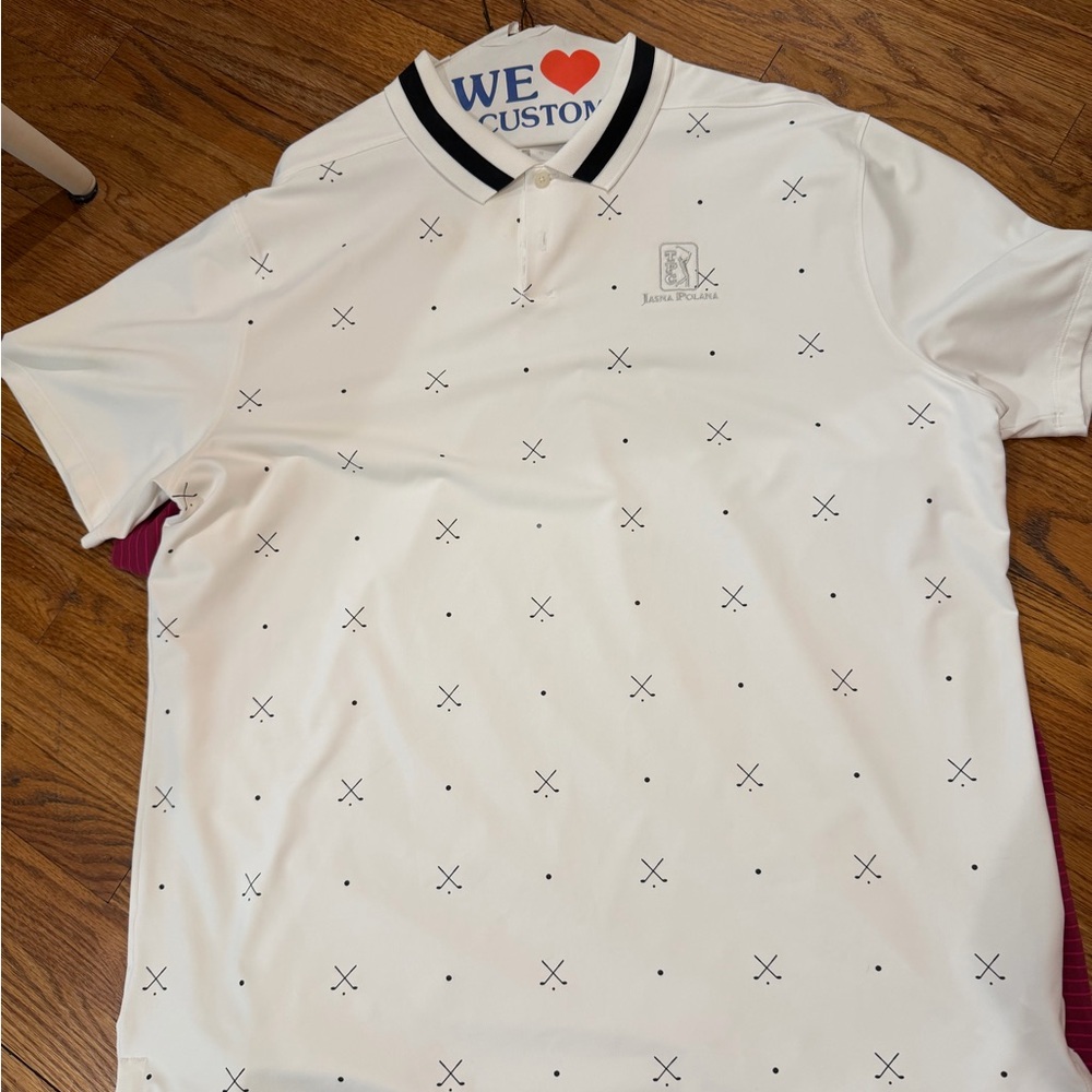 Nike White Polo with Black Trim and Dot-Cross Pattern